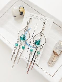 ✧ Introducing our Honkai Star Rail Inspired Earring Collection ✧ ✧ Aventurine: Symmetrical silver earrings inspired by his in-game earring. These earrings are long and dramatic with a 3.5 inches drop length. Made with beautiful aventurine-colored beaded accents and stainless steel bars that swing beautifully. Available to purchase 1 earring or the set. ✧ All earrings are designed by us and made in-house. These earrings were inspired by the characters themselves and are not made to be exact replicas from the game.  ✧ These earrings are made with those metal allergies in mind. Earring hooks are 316 surgical stainless steel (gold and silver). Diy Luxury, Unisex Earrings, Earring Collection, Honkai Star Rail, Wardrobe Ideas, Fantasy Jewelry, Earring Hooks, Star Rail, Earrings Collection