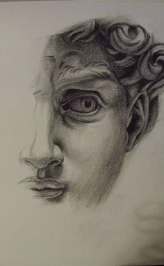 a pencil drawing of a man's face with curls on his head and eyes