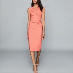 Reiss Alex Sleeveless Twist Front Bodycon Dress Color: Coral Size: 8 Measurements(Laying Flat): Armpit To Armpit: 16” Waist: 14.5” Length: 45” Material: 96% Viscose 4% Elastane Trim: 100% Polyester Care Info: Dry Clean New With Tag! Display Dress In Good Condition! Has Signs/Marks Of Being Tried On/Handled In Store - See Photos! Should Come Out With Dry Cleaning! Comes From A Smoke/Pet Free Home! Sleeveless Ruched Bodycon Dress For Work, Pink Sleeveless Formal Dress, Pink Sleeveless Midi Dress For Cocktail, Pink Sleeveless Cocktail Midi Dress, Chic Pink Sleeveless Maxi Dress, Feminine Fitted Sleeveless Pink Dress, Elegant Pink Fitted Sleeveless Dress, Elegant Pink Knee-length Sleeveless Dress, Pink Sleeveless Bodycon Dress For Cocktail