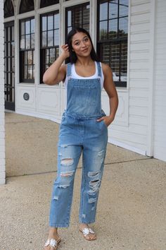 "Get ready to rock a cool, casual look with our Distressed Denim Overalls! The perfect mix of comfort and style, these overalls feature a loose fit and handy pocket for all your essentials. Say goodbye to boring outfits and hello to effortless cool. Denim never looked so good!" Everyday Dark Wash Overalls With Pockets, Casual Straight Leg Denim Jumpsuit With Pockets, Fall Medium Wash Overalls With Pockets, Everyday Denim Overalls With Pockets, Casual Medium Wash Denim Jumpsuit With Side Pockets, Casual Dark Wash Denim Jumpsuit With Side Pockets, Utility Overalls With Relaxed Fit For Everyday, Casual Denim Jumpsuit With Side Pockets, Casual Cotton Overalls For Everyday