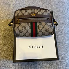 Brand New Comes With Box And Dust Bag With A Strap Brown Gucci Rectangular Bag, Gucci Brown Bag Perfect For Gift, Brown Gucci Bag As Gift, Luxury Gucci Shoulder Bag With Original Box, Classic Gucci Bag For Gift, Gucci Bucket Bag, Gg Marmont Bag, Gucci Gg Marmont Matelasse, Gucci Vintage Bag