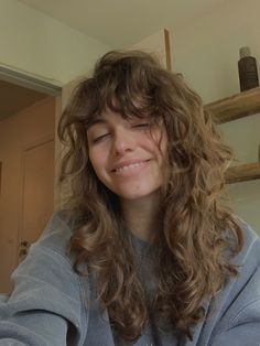 Hair, bangs, wavy hair, fall hair Caitibugzz Curly Hair, Haircuts To Bring Out Natural Waves, Curly Bangs Shag, Wavy Rockstar Hair, Layered Wavy Hair Medium Shag, Bangs On 2b Hair, M Shaped Bangs, Wavy Hair Lots Of Layers, Fringe Bangs On Curly Hair