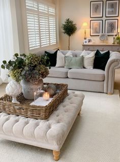 a living room filled with furniture and decor