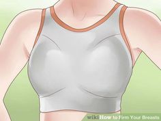 a woman wearing a sports bra with her hands on her hips