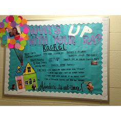 a bulletin board with balloons attached to it