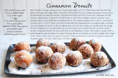 cinnamon donuts on a tray with powdered sugar