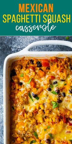 mexican spaghetti casserole with black olives, peppers and cheese in a white dish