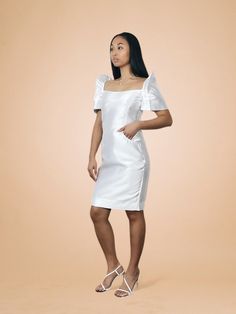 Ready-to-Wear This all white mikado satin, décolletage revealing dress is minimal, with a knee length sheath silhouette that’s flattering for any body type. As with many of our dresses, this one has two front pockets that are incorporated into the design lines. Each Shoulder Sheath Dress Terno is handcrafted by the VINTA Gallery team in our atelier in the Philippines. Material and Care Instructions - Mikado satin 100% polyester.- Dry clean or Steam and/or iron on low to medium heat. Size Chart M Terno Dress, Filipiniana Wedding, Filipiniana Dress, Revealing Dress, Insurance Coverage, How To Take, All White, The Philippines, Dresses Xs