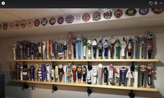 a shelf filled with lots of different types of medals