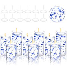 blue and white candles are lined up in rows with bubbles on the top one candle is lit