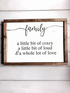 a sign that says, family a little bit of crazy a little bit of loud and a whole lot of love