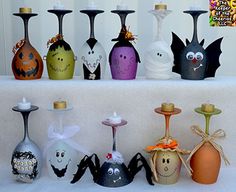 there are many different vases with faces on them