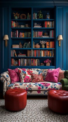 a living room filled with furniture and bookshelves covered in lots of colorful books