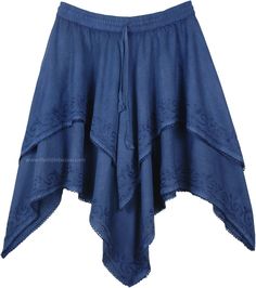 Denim blue high low handkerchief hem skirt stitched in two full layers of soft and flowing rayon fabric. A fun and flirty western style skirt, from rodeo's to barn dancing, it fits in everywhere. It's gorgeous hemline is framed by abstract embroidery, creating an eye-catching masterpiece. The perfect skirt for the on-the-go woman due to its versatile nature, you can wear this skirt with a simple, light blouse in the summer, or leggings, a sweater, and boots in winters. Length: 26" - 36"; Waist: Bohemian Flowy Asymmetrical Skirt, Bohemian Cotton Skirt With Handkerchief Hem, Bohemian Handkerchief Hem Festival Bottoms, Spring Festival Bottoms With Asymmetrical Hem, Bohemian Handkerchief Hem Bottoms For Beach, Bohemian Cotton Skirt With Asymmetrical Hem, Fitted Peasant Tiered Skirt Bottoms, Peasant Style Fitted Tiered Skirt, Fitted Peasant Style Tiered Skirt