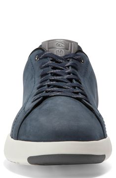 A low lace-to-toe profile cinches the timelessness of a sneaker updated with a solid leather upper for easy integration across your casual wardrobe. Signature Grand.OS technology in the footbed provides anatomically engineered cushioning and support for all-day comfort. Lace-up style Grand.OS energy-foam footbed Leather upper/textile lining/synthetic sole Imported Men's Shoes Leather Custom Sneakers With Boost Midsole, Classic Lace-up Walking Shoes With Boost Midsole, Leather Walking Shoes With Boost Midsole And White Sole, Low-top Lace-up Shoes With Cushioned Footbed, Leather Lace-up Walking Shoes With Boost Midsole, Tennis Sneakers, Sporty Sneakers, Sneaker Men, Eva Sole