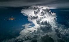 an aerial view of a large cloud in the sky