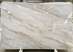 a large white marble slab in a warehouse