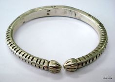 "vintage antique tribal old silver armlet bracelet from rajasthan india. Made of solid silver and then engraved design on it, Worn by tribal people of Rajasthan. great handmade design, good for jewelry collection. Inner diameter side to side - 7.4 cm (2.9\") Inner circumference - 22.4 cm (8.8\") weight - 120 grams material - Good silver and original old worn piece." Traditional Oxidized Sterling Silver Bracelet For Festivals, Traditional Sterling Silver Bracelet With Oxidized Finish For Festivals, Traditional Sterling Silver Bracelet For Ceremonial Occasions, Traditional Ceremonial Sterling Silver Bracelet, Handmade Traditional Sterling Silver Bracelet, Traditional Antique Silver Cuff Bracelet With Oxidized Finish, Traditional Sterling Silver Adjustable Bracelet For Ceremonial Wear, Traditional Silver Carved Bangle, Traditional Engraved Sterling Silver Bracelet For Ceremonial Use