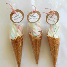 three ice cream cones with labels on them