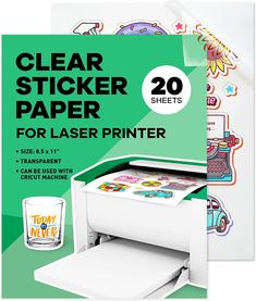 the clear sticker paper for laser printers is in front of an image of a glass