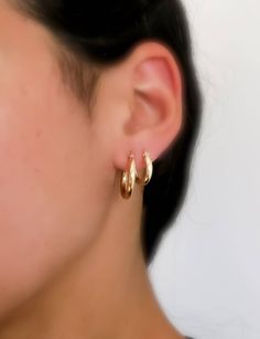 "Simple. Chic. Minimalist™ These earrings sell as a PAIR. A pair of perfectly dainty, thick Gold hoop earrings handcrafted from High quality 14K Gold filled or Sterling Silver. Very dainty and delicate earrings that you'll cherish. Earrings are 3mm thick And are made only with top quality materials Model is wearing 0.8\" and 0.6\" hoops Also available with Sterling silver. ❤️ Available in other sizes! Pls select your preferred material and size from the drop down menus. Size convert: 0.6 inch= 1 Thick Gold Hoop Earrings, Thick Gold Hoops, Simple Hoop Earrings, Hoops Gold, Gold Filled Hoops, Simple Chic, Cat Necklace, Pretty Gift, Delicate Earrings