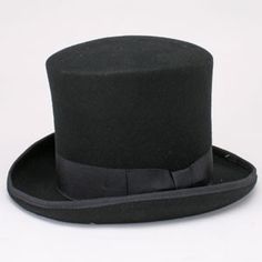 Wool Felt Bell Crown Top Hat A true bell crown top hat, this high-quality, wool felt, flared top hat is perfect for Ebenezer Scrooge or Jean Valjean.  The crown is 8 tall, the turned brim is banded, and a grosgrain ribbon completes the look. An interior multi-fit sweatband provides for a good fit. This hat is well-suited for A Christmas Carol, Les Miserables, the Mad Hatter in Alice inWonderland, Pride and Prejudice, Sense and Sensibility, as well as Victorian-era events. Wool felt 8 tall crown Tall Crown, Jean Valjean, Ebenezer Scrooge, Sense And Sensibility, Flared Top, The Mad Hatter, A Christmas Carol, Flare Top, Quality Hats