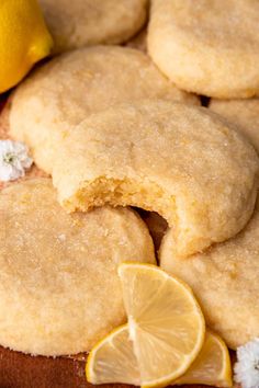 some lemon cookies are cut in half on a table