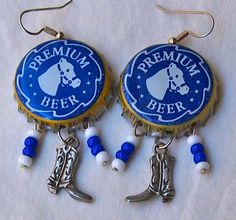 the earrings are decorated with blue and white beads, cowboy boots, and a cowgirl's boot