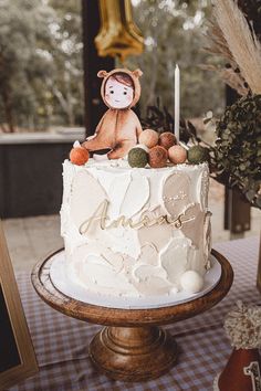 a white cake sitting on top of a table