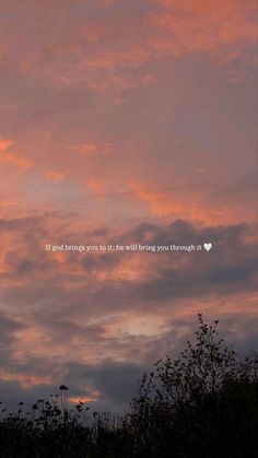 the sky is filled with pink clouds and there is a quote written in the middle