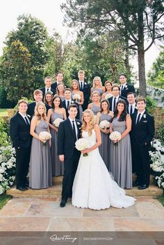 a large group of people in formal wear