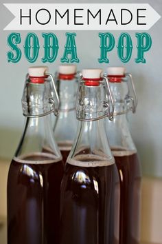 homemade soda pop recipe in three glass bottles