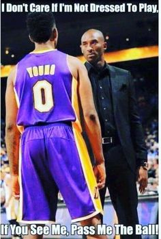 two basketball players standing next to each other in front of a man wearing a suit