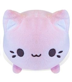 a white cat stuffed animal with black eyes and pink ears on it's head