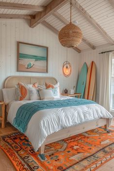 a bedroom with a surfboard hanging from the ceiling and an orange rug on the floor