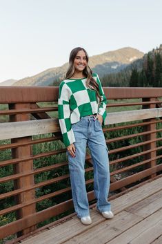 Get ready to rock the back to school season with THE KYAH LONG SLEEVE CHECKERED TOP IN GREEN! This cute top features a fun checkered print, perfect for adding some playful style to your wardrobe. The long sleeves and soft material make it a cozy choice for cooler days. Don't miss out on this must-have piece! Paired with THE JUST BLACK DENIM LYNN STRETCH CARGO PANTS IN MEDIUM DENIM and THE CASUAL SNEAKERS IN GREY Long Sleeves Checkered pattern Round neck 70% Viscose, 30% Polyester Fits true to si Happy Threads, Summer Goddess, Checker Top, Checkered Top, Pink Desert, Playful Style, Just Black, Checkered Print, Checker Print