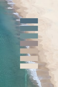 an aerial view of the ocean and beach