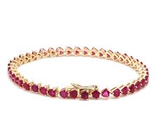 Ruby trillion cut tennis bracelet in 14k 18k gold, Natural 4mm 7-8ct ruby tennis bracelet chain gold, July birthstone red ruby bracelet gold STONE DETAILS : ✦ Gemstone: Ruby ✦ Gemstone Type : Natural ✦ Gemstone Size : 4mm ✦ Gemstone Shape : Trillion cut ✦ Number of gemstones : 43 ✦ Gemstone Weight : 7-8 carats ✦ Gemstone Grade : AAAA METAL DETAILS : ✦ Metal : 14K/18K Gold ✦ Metal Color : Yellow / White / Rose Gold ✦ Setting : Prong Setting ✦ Ring Box : Yes SHIPPING DETAILS : ✦ Shipped via ; USPS Valentine's Day Gift Tennis Bracelet, Ruby Gemstone Tennis Bracelet In Fine Jewelry Style, Ruby Tennis Bracelet In Yellow Gold For Anniversary, Ruby Gemstone Tennis Bracelet, Anniversary Ruby Tennis Bracelet In Yellow Gold, Classic Gold Ruby Tennis Bracelet, Gold Ruby Tennis Bracelet Gift, Yellow Gold Ruby Tennis Bracelet For Anniversary, Gold Ruby Tennis Bracelet As A Gift