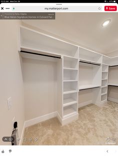 an image of a room with white shelves and carpeted flooring on the phone