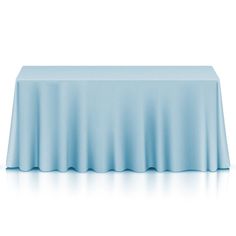 a light blue table cloth on top of a white table with no people around it