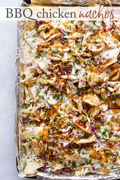 a casserole dish with chicken nachos in it