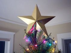 a christmas tree decorated with lights and a star