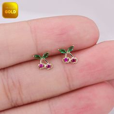 Metal: 14k solid gold, Available Gold color: Yellow gold  Guaranteed Authentic :14k Solid Gold，Not Gold Plated or Gold Filled Stone: CZ Thickness:0.82mm (20G) Stamp:14k ★Every ear is different, the length of backings that most suitable for your ear will depend on your ear thickness ★Titanium is a very safe metal, so we don't plate it, in order to avoid some people are allergic to the plating material. NOTE The item combined by 14k solid gold and implant grade titanium push in back,  packed in a beautiful Jewelry Box   SHIPPING ADDRESS All the orders will ship to the supplied address through your Etsy Order, Please leave your phone number,will give to carrier for safe deliver. We will not send and replacement parcels due to incomplete or inaccurate address.  PACKING ●Can be Gift packed incl 14k Gold Red Earrings For Pierced Ears, Dainty Red 14k Gold Earrings, Tragus Stud, Conch Earring, Flat Back Earrings, Cartilage Earring, Red Cherry, Gift Packs, Cartilage Earrings