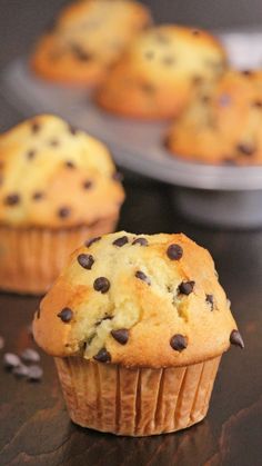 chocolate chip muffins sitting on top of a table