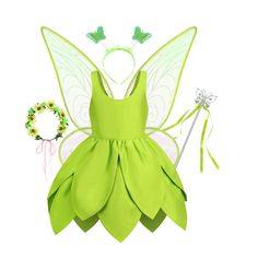 a green fairy dress with wings and tiara next to it's hair clip