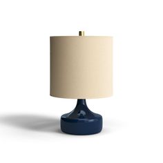 a blue table lamp on a white background