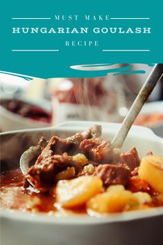 a close up of a bowl of food on a table with the words must make hungarian goulash recipe