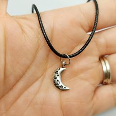 Crescent moon 🌙 and stars charm on 18 inch faux leather cord. Adjustable Crescent Moon Charm Necklace, Adjustable Crescent Moon Phase Charm Necklace, Adjustable Celestial Moon Charm Necklace, Adjustable Round Charm Necklace With Moon Charm, Adjustable Round Moon Charm Necklace, Adjustable Moon Charm Necklace With Round Pendant, Adjustable Moon Phase Charm Necklace Gift, Adjustable Crescent Charm Necklace For Gift, Adjustable Round Pendant Charm Necklace With Moon Charm