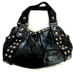 Authentic, Gorgeous Thick Pebbled Black Leather Kooba Jillian Bag. Stud Details. In Excellent Condition. Dual Carry Handles, Magnetic Closure, Signature Plate On Side. One Zip And 2 Slip Pockets On Inside. Magnetic Snap Top. One Zip Interior Pocket And Two Open Slide Pockets. Two Outside Magnetic Snap Pockets. .Measures Approximately 15" X 14" X 9". Strap Drop Is About 10". Edgy Black Leather Satchel, Edgy Leather Crossbody Satchel, Edgy Leather Shoulder Bag With Metal Hardware, Edgy Leather Bag For Daily Use, Black Edgy Bags With Palladium Hardware, Edgy Black Shoulder Bag With Palladium Hardware, Edgy Black Bags With Palladium Hardware, Edgy Leather Shoulder Bag For Daily Use, Edgy Leather Bag For Everyday Use