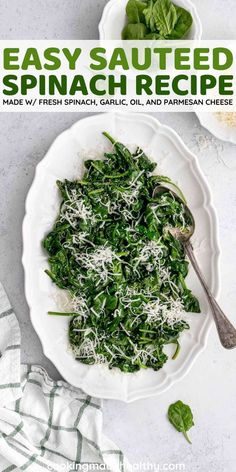 a white plate topped with spinach and parmesan cheese